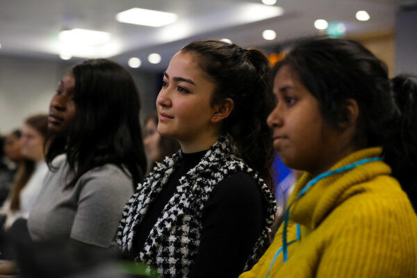 Attendees at a Stemettes event listening to a talk.