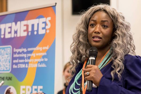 Head Stemette AMI talking into a microphone.